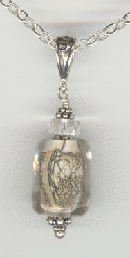 Heavily-Encased Silvered Ivory Pendant